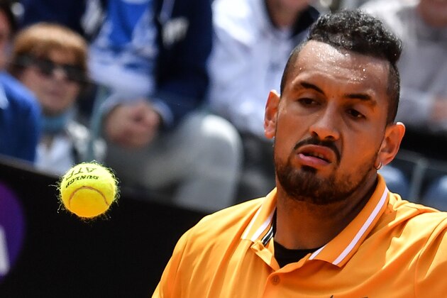 Australia's Nick Kyrgios returns the ball to Russia's Daniil Medvedev (unseen) during their ATP Masters tournament tennis match at the Foro Italico in Rome on May 14, 2019. (Photo by Andreas SOLARO / AFP)        (Photo credit should read ANDREAS SOLARO/AFP/Getty Images)