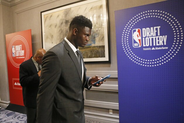 Duke's Zion Williamson arrives for the NBA basketball draft lottery Tuesday, May 14, 2019, in Chicago. (AP Photo/Nuccio DiNuzzo)