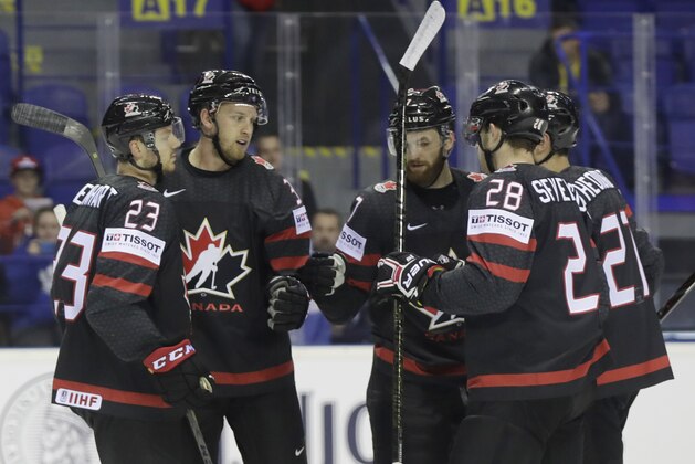 Canada's Anthony Mantha, 2nd left, celebrates with teammates after scoring his sides first goal during the Ice Hockey World Championships group A match between Canada and France at the Steel Arena in Kosice, Slovakia, Thursday, May 16, 2019. (AP Photo/Petr David Josek)
