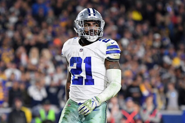 LOS ANGELES, CA - JANUARY 12:  Ezekiel Elliott #21 of the Dallas Cowboys celebrates after scoring a 1 yard touchdown in the third quarter against the Los Angeles Rams in the NFC Divisional Playoff game at Los Angeles Memorial Coliseum on January 12, 2019 in Los Angeles, California.  (Photo by Harry How/Getty Images)