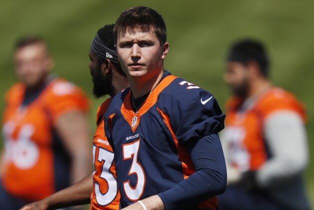 Denver Broncos rookie quarterback Drew Lock takes part in drills during an NFL football organized training activity session at the team's headquarters Monday, May 13, 2019, in Englewood, Colo. (AP Photo/David Zalubowski)