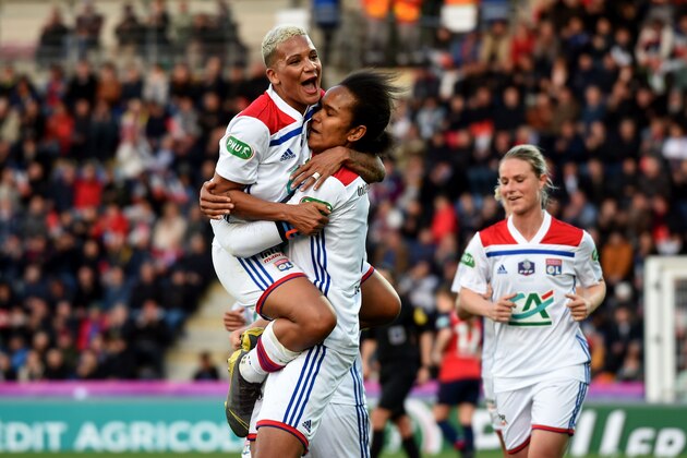 Lyon's Netherland forward Shanice Van De Sanden (L) celebrates with Lyon's French defender Wendie Renard (C) after scoring a goal during the French Cup final women football match between Olympique Lyonnais (OL) and Lille (LOSC), on May 8, 2019, at the Stade Gaston Petit in Chateauroux, Central France. (Photo by GUILLAUME SOUVANT / AFP)        (Photo credit should read GUILLAUME SOUVANT/AFP/Getty Images)