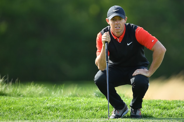 FARMINGDALE, NEW YORK - MAY 16: Rory McIlroy of Northern Ireland lines up a putt on the 12th green during the first round of the 2019 PGA Championship at the Bethpage Black course on May 16, 2019 in Farmingdale, New York. (Photo by Stuart Franklin/Getty Images)