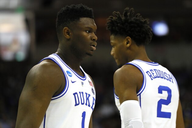 COLUMBIA, SOUTH CAROLINA - MARCH 24: Zion Williamson #1 of the Duke Blue Devils talks with Cam Reddish #2 against the UCF Knights during the first half in the second round game of the 2019 NCAA Men's Basketball Tournament at Colonial Life Arena on March 24, 2019 in Columbia, South Carolina. (Photo by Kevin C.  Cox/Getty Images)