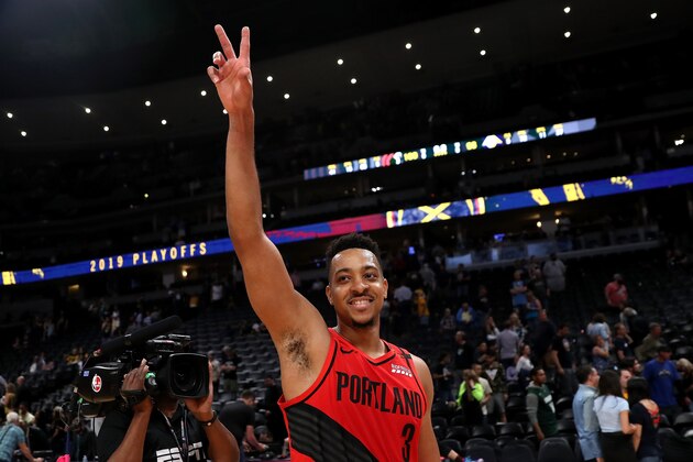 DENVER, COLORADO - MAY 12: CJ McCollum #3 of the Portland Trail Blazers celebrates their win against the Denver Nuggetts during Game Seven of the Western Conference Semi-Finals of the 2019 NBA Playoffs at the Pepsi Center on May 12, 2019 in Denver, Colorado. NOTE TO USER: User expressly acknowledges and agrees that, by downloading and or using this photograph, User is consenting to the terms and conditions of the Getty Images License Agreement. (Photo by Matthew Stockman/Getty Images)