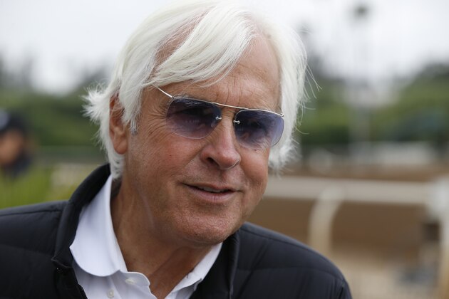 In this May 24, 2018, photo, Hall of Fame trainer Bob Baffert takes questions about horse Justify at Santa Anita Park in Arcadia, Calif. The only thing Baffert wanted to do in horse racing was win the Triple Crown. Been there, done that in 2015 with American Pharoah. Now, the white-haired trainer is back with another chance to saddle a colt to a sweep of the Kentucky Derby, Preakness and Belmont stakes. Justify could become racing's 13th Triple Crown winner and second in four years if he wins the Belmont Stakes on Saturday, June 9. (AP Photo/Damian Dovarganes)