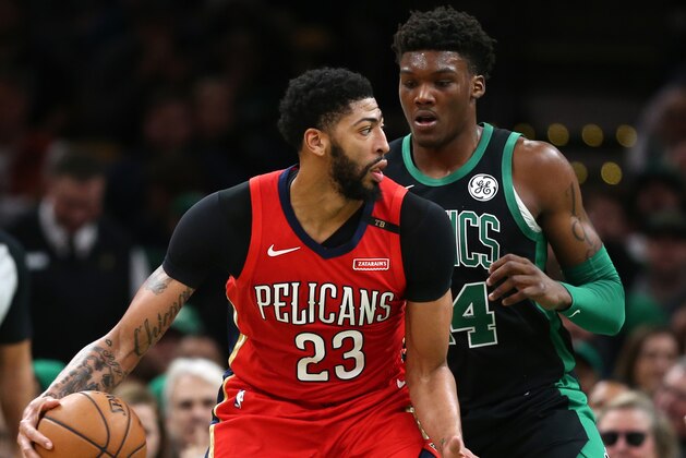 BOSTON, MA - DECEMBER 10: Robert Williams #44 of the Boston Celtics defends Anthony Davis #23 of the New Orleans Pelicans during the second half of the game at TD Garden on December 10, 2018 in Boston, Massachusetts. (Photo by Maddie Meyer/Getty Images)