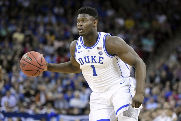 FILE - In this March 24, 2019, file photo, Duke forward Zion Williamson (1) dribbles the ball against Central Florida during the first half of a second-round game in the NCAA men's college basketball tournament in Columbia, S.C. Williamson was named the John R. Wooden Men's Player of the year at the College Basketball Awards ceremony in Los Angeles, Friday, April 12, 2019. (AP Photo/Sean Rayford, File)