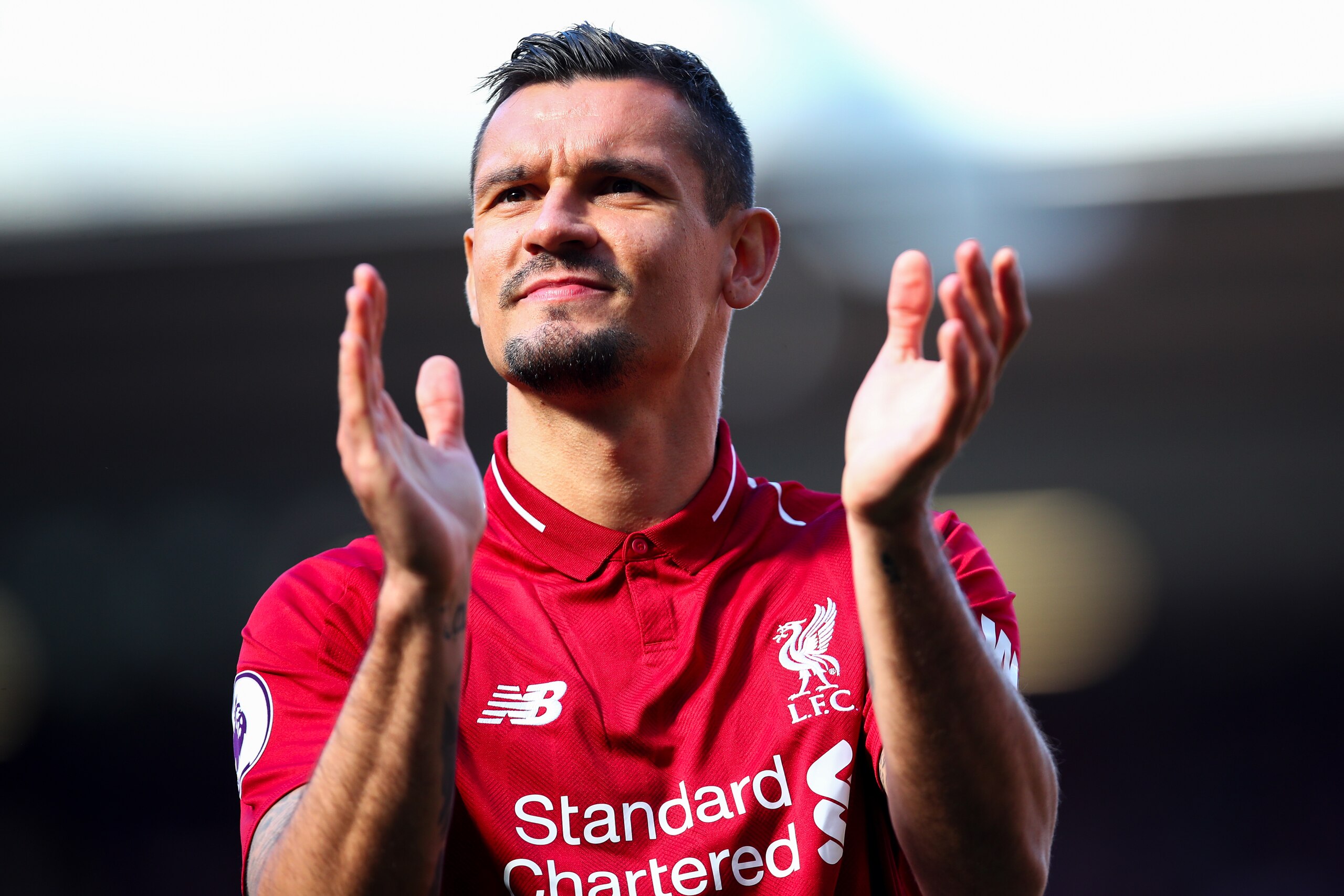 LIVERPOOL, ENGLAND - MAY 12: Dejan Lovren of Liverpool applauds the fans during the Premier League match between Liverpool FC and Wolverhampton Wanderers at Anfield on May 12, 2019 in Liverpool, United Kingdom. (Photo by Robbie Jay Barratt - AMA/Getty Images)