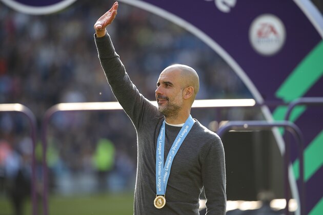BRIGHTON, ENGLAND - MAY 12: Pep Guardiola the head coach / manager of Manchester City during the celebrations of becoming 2019 Champions after the Premier League match between Brighton & Hove Albion and Manchester City at American Express Community Stadium on May 12, 2019 in Brighton, United Kingdom. (Photo by Matthew Ashton - AMA/Getty Images)