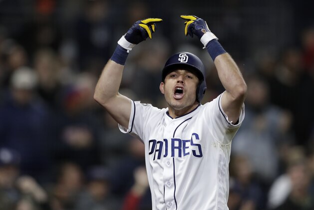 San Diego Padres' Ian Kinsler celebrates after hitting a three-run home run during the sixth inning of the team's baseball game against the Pittsburgh Pirates, Thursday, May 16, 2019, in San Diego. (AP Photo/Gregory Bull)
