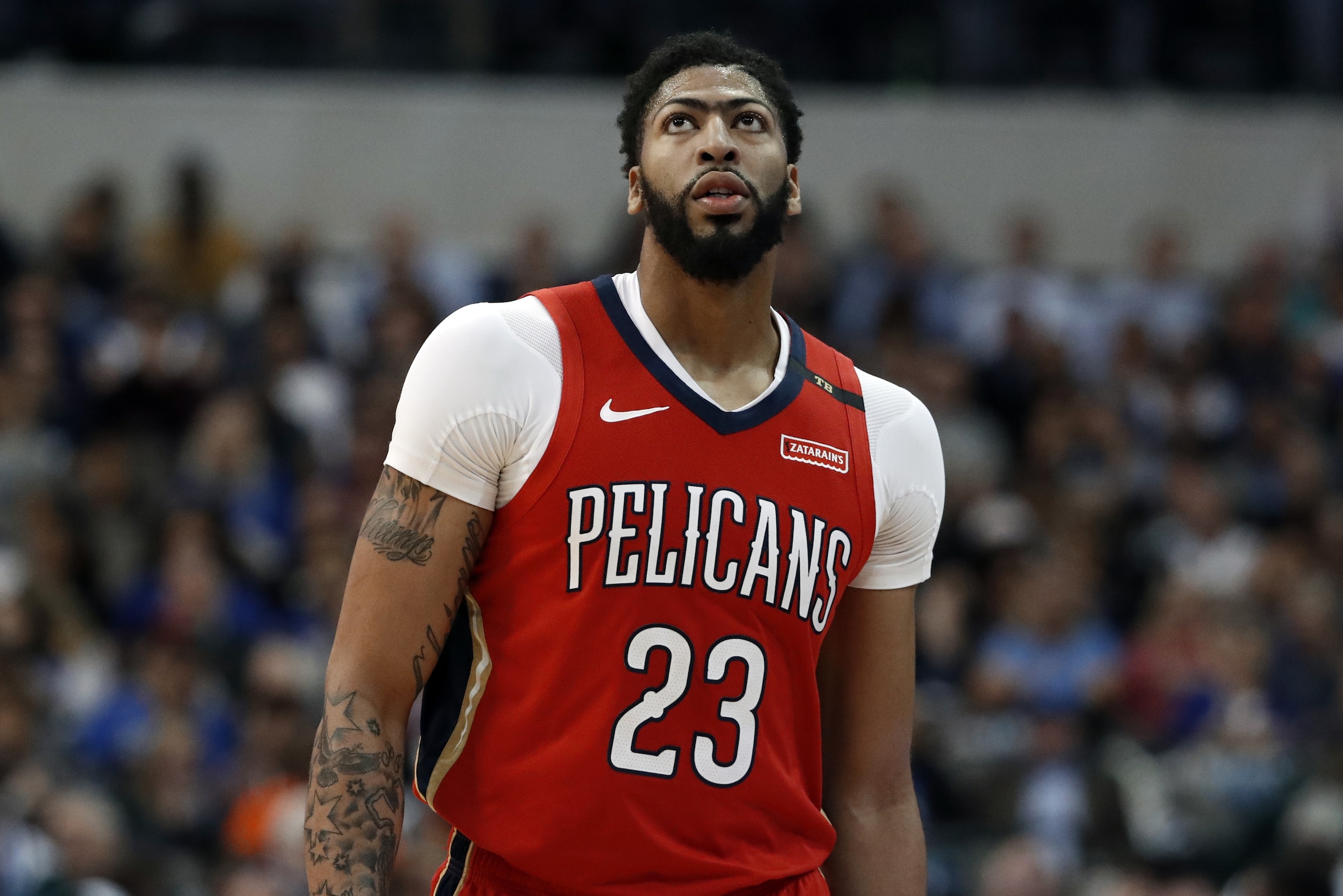New Orleans Pelicans' Anthony Davis walks on the court during an NBA basketball game against the Dallas Mavericks in Dallas, Monday, March 18, 2019. (AP Photo/Tony Gutierrez) New Orleans Pelicans' Anthony Davis walks on the court during an NBA basketball game against the Dallas Mavericks in Dallas, Monday, March 18, 2019. (AP Photo/Tony Gutierrez)
