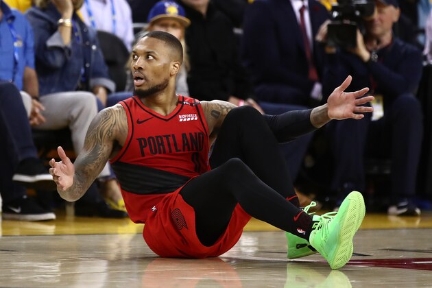OAKLAND, CALIFORNIA - MAY 16: Damian Lillard #0 of the Portland Trail Blazers reacts to a play in game two of the NBA Western Conference Finals against the Golden State Warriors at ORACLE Arena on May 16, 2019 in Oakland, California. NOTE TO USER: User expressly acknowledges and agrees that, by downloading and or using this photograph, User is consenting to the terms and conditions of the Getty Images License Agreement. (Photo by Ezra Shaw/Getty Images)