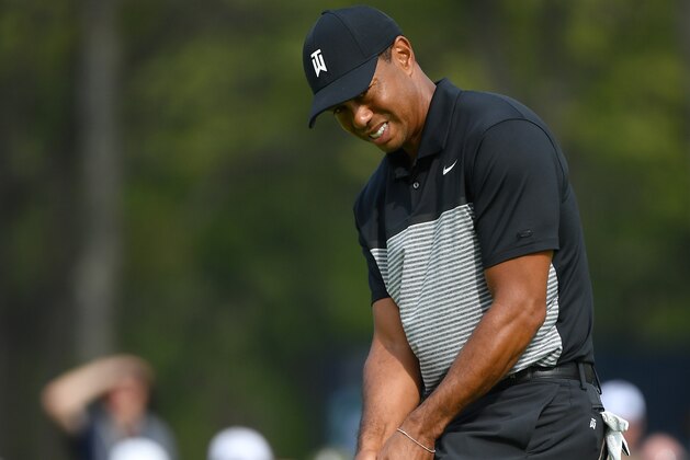 FARMINGDALE, NEW YORK - MAY 17: Tiger Woods of the United States reacts to missed putt on the 11th green during the second round of the 2019 PGA Championship at the Bethpage Black course on May 17, 2019 in Farmingdale, New York. (Photo by Stuart Franklin/Getty Images)