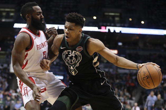 Milwaukee Bucks' Giannis Antetokounmpo tries to drive past Houston Rockets' James Harden during the second half of an NBA basketball game Wednesday, March 7, 2018, in Milwaukee. (AP Photo/Morry Gash)