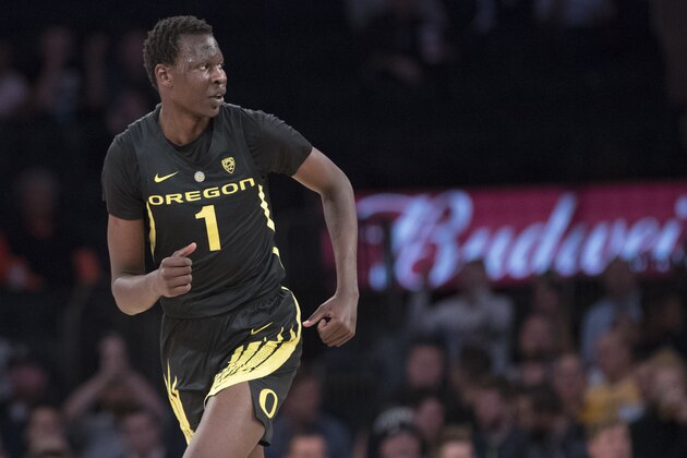 Oregon center Bol Bol runs down court during the first half of an NCAA college basketball game against Iowa in the 2K Empire Classic, Thursday, Nov. 15, 2018, at Madison Square Garden in New York. (AP Photo/Mary Altaffer)