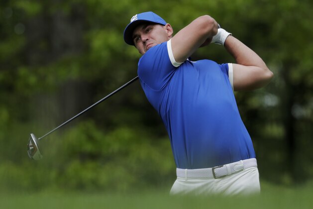 Brooks Koepka hits off the ninth tee during the second round of the PGA Championship golf tournament, Friday, May 17, 2019, at Bethpage Black in Farmingdale, N.Y. (AP Photo/Julio Cortez)