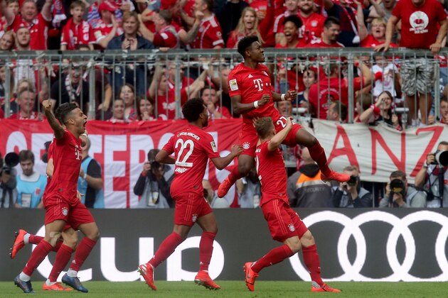 MUNICH, GERMANY - MAY 18: Thiago Alcantara of FC Bayern Muenchen, Serge Gnabry of FC Bayern Muenchen and David Alaba of FC Bayern Muenchen celebrate after scoring his team's second goal during the Bundesliga match between FC Bayern Muenchen and Eintracht Frankfurt at Allianz Arena on May 18, 2019 in Munich, Germany. (Photo by TF-Images/Getty Images)
