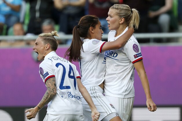 BUDAPEST, HUNGARY - MAY 18: Ada Hegerberg of Olympique Lyonnais #14 celebrates her goal with Amel Majri of Olympique Lyonnais (r2) and Jessica Fishlock of Olympique Lyonnais #24 during the UEFA Women's Champions League Final match between Olympique Lyonnais and FC Barcelona at Ferencvaros Stadium on May 18, 2019 in Budapest, Hungary. (Photo by Laszlo Szirtesi/Getty Images)