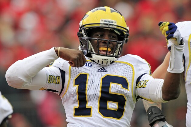 Michigan quarterback Denard Robinson celebrates his 67-yard touchdown run against Ohio State in the second quarter of an NCAA college football game Saturday, Nov. 24, 2012, in Columbus, Ohio. (AP Photo/Jay LaPrete)
