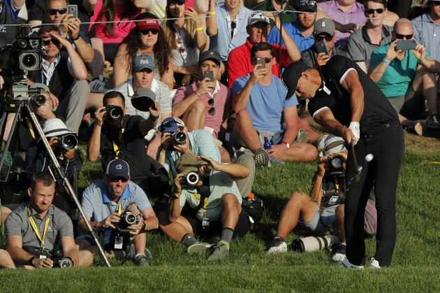 Brooks Koepka hits off the 17th tee during the third round of the PGA Championship golf tournament, Saturday, May 18, 2019, at Bethpage Black in Farmingdale, N.Y. (AP Photo/Andres Kudacki)