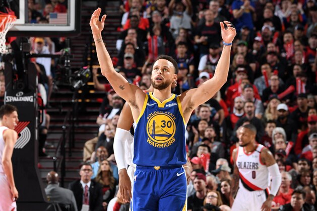 PORTLAND, OR - MAY 18: Stephen Curry #30 of the Golden State Warriors reacts to a play against the Portland Trail Blazers during Game Three of the Western Conference Finals on May 18, 2019 at the Moda Center in Portland, Oregon. NOTE TO USER: User expressly acknowledges and agrees that, by downloading and/or using this photograph, user is consenting to the terms and conditions of the Getty Images License Agreement. Mandatory Copyright Notice: Copyright 2019 NBAE (Photo by Andrew D. Bernstein/NBAE via Getty Images)