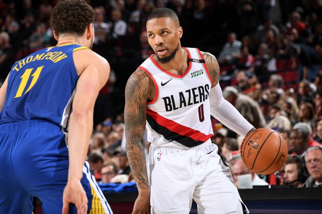 PORTLAND, OR - MAY 18: Damian Lillard #0 of the Portland Trail Blazers handles the ball against the Golden State Warriors during Game Three of the Western Conference Finals on May 18, 2019 at the Moda Center in Portland, Oregon. NOTE TO USER: User expressly acknowledges and agrees that, by downloading and/or using this photograph, user is consenting to the terms and conditions of the Getty Images License Agreement. Mandatory Copyright Notice: Copyright 2019 NBAE (Photo by Andrew D. Bernstein/NBAE via Getty Images)