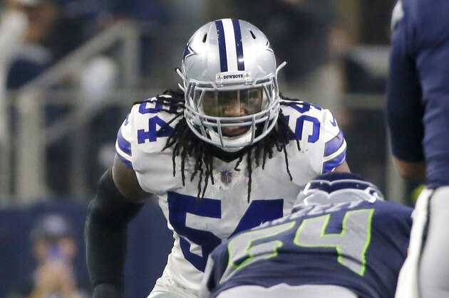 Dallas Cowboys linebacker Jaylon Smith, rear, lines up against Seattle Seahawks linebacker Bobby Wagner (54) and quarterback Russell Wilson (3) during an NFC wild-card NFL football game in Arlington, Texas, Saturday, Jan. 5, 2019.(AP Photo/Roger Steinman)