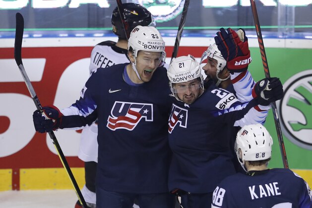 Dylan Larkin of the US, center, celebrates with teammates after scoring his sides second goal during the Ice Hockey World Championships group A match between Germany and the United States at the Steel Arena in Kosice, Slovakia, Sunday, May 19, 2019. (AP Photo/Petr David Josek)