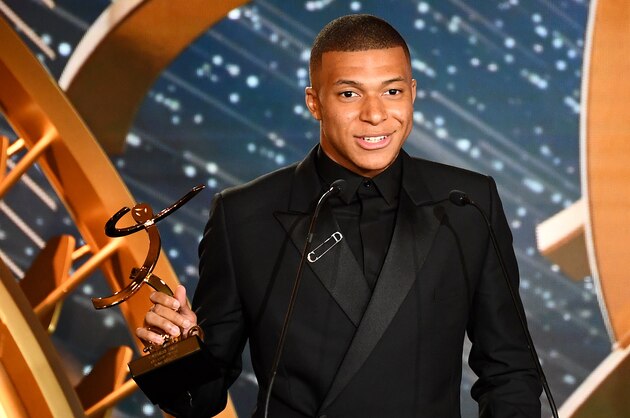 Paris Saint-Germain's French forward Kylian Mbappe delivers a speech after receiving the best hope player award, on May 19, 2019 in Paris, during the 28th edition of the UNFP (French National Professional Football players Union) trophy ceremony. (Photo by FRANCK FIFE / AFP)        (Photo credit should read FRANCK FIFE/AFP/Getty Images)
