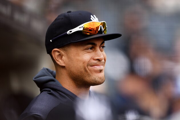 NEW YORK, NEW YORK - APRIL 21: Giancarlo Stanton #27 of the New York Yankees looks on from the dugout during the fifth inning of the game against the Kansas City Royals at Yankee Stadium on April 21, 2019 in the Bronx borough of New York City. (Photo by Sarah Stier/Getty Images)