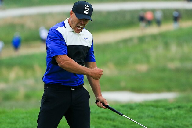 FARMINGDALE, NEW YORK - MAY 19: Brooks Koepka of the United States reacts after putting in to win on the 18th green during the final round of the 2019 PGA Championship at the Bethpage Black course on May 19, 2019 in Farmingdale, New York. (Photo by Mike Ehrmann/Getty Images)