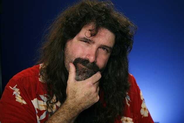 FILE - This May 19, 2011, file photo, shows Mick Foley posed  in New York. Foley is a best-selling author and a WWE Hall of Famer. But the hardcore legend enjoys his latest role even more, playing Santa Claus in the Morgan Spurlock-backed documentary