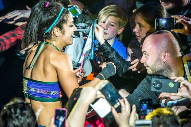 Bayley mixes with spectators during the WWE show at Zenith Arena on may 09, 2017 in Lille, France. / AFP PHOTO / PHILIPPE HUGUEN        (Photo credit should read PHILIPPE HUGUEN/AFP/Getty Images)