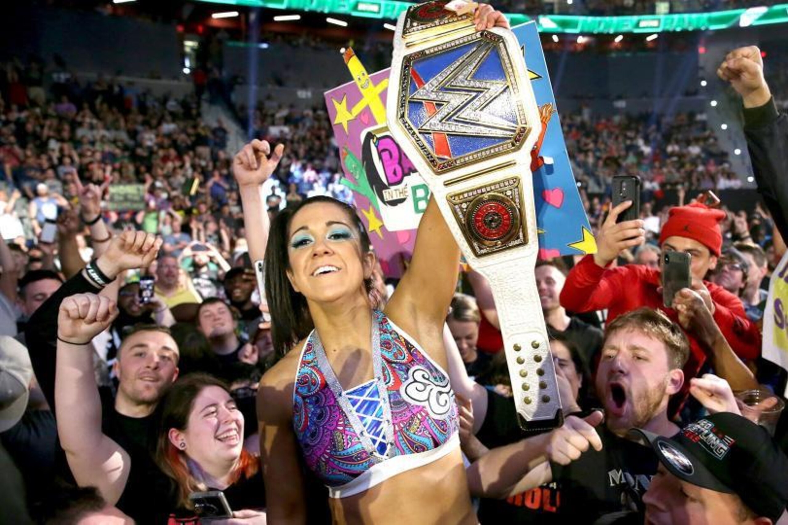 Bayley celebrating with the crowd at Money in the Bank.