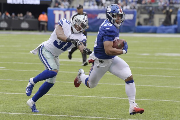 Dallas Cowboys' Byron Jones, left, tries to catch New York Giants' Saquon Barkley during the first half of an NFL football game, Sunday, Dec. 30, 2018, in East Rutherford, N.J. (AP Photo/Bill Kostroun) Dallas Cowboys' Byron Jones, left, tries to catch New York Giants' Saquon Barkley during the first half of an NFL football game, Sunday, Dec. 30, 2018, in East Rutherford, N.J. (AP Photo/Bill Kostroun)