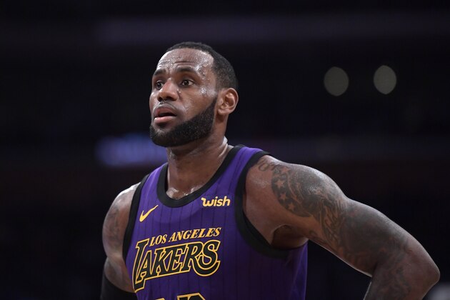 Los Angeles Lakers forward LeBron James stands on the court during the second half of an NBA basketball game against the Brooklyn Nets Friday, March 22, 2019, in Los Angeles. The Nets won 111-106. (AP Photo/Mark J. Terrill) Los Angeles Lakers forward LeBron James stands on the court during the second half of an NBA basketball game against the Brooklyn Nets Friday, March 22, 2019, in Los Angeles. The Nets won 111-106. (AP Photo/Mark J. Terrill)