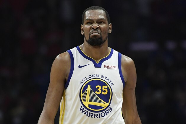 Golden State Warriors forward Kevin Durant scowls after scoring during the second half in Game 6 of a first-round NBA basketball playoff series against the Los Angeles Clippers Friday, April 26, 2019, in Los Angeles. The Warriors won 129-110. (AP Photo/Mark J. Terrill)