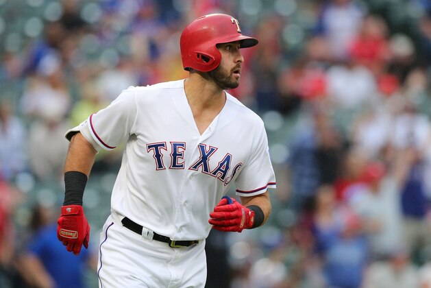 ARLINGTON, TX - SEPTEMBER 23: Joey Gallo #13 of the Texas Rangers watches his solo home run shot in the eighth inning of a game against the Seattle Mariners at Globe Life Park in Arlington on September 23, 2018 in Arlington, Texas.  (Photo by Richard Rodriguez/Getty Images)