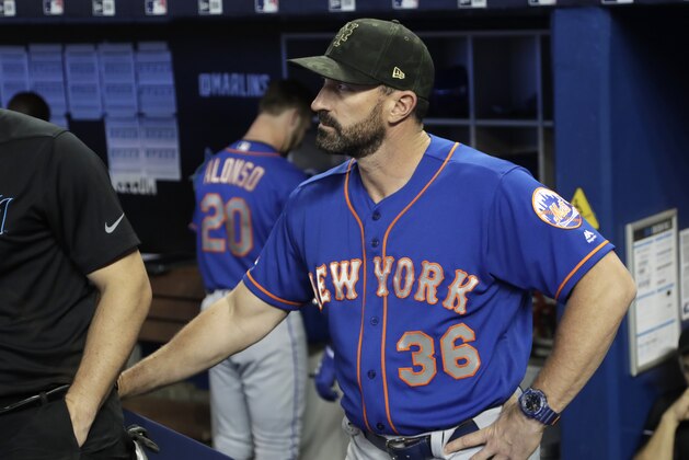 New York Mets manager Mickey Callaway (36) stands in the dugout before a baseball game, Sunday, May 19, 2019, in Miami. The Marlins won 3-0. (AP Photo/Lynne Sladky)