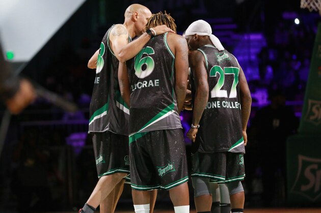 LOS ANGELES, CA - JUNE 23:  (L-R) Doug Christie, Lecrae, and Larry 'Bone Collector' Williams huddle at the Celebrity Basketball Game Sponsored By Sprite during the 2018 BET Experience at Los Angeles Convention Center on June 23, 2018 in Los Angeles, California.  (Photo by Leon Bennett/Getty Images for BET)