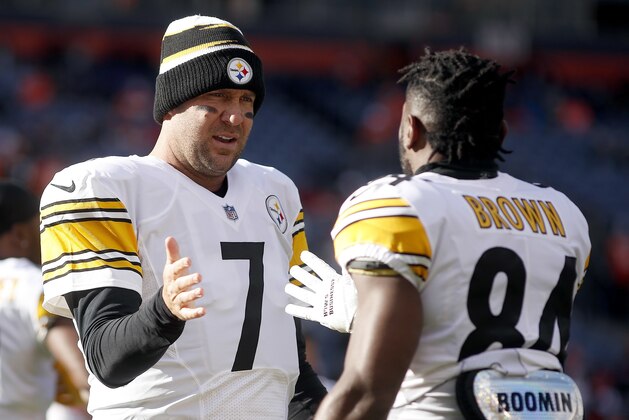 Pittsburgh Steelers wide receiver Antonio Brown (84) greets quarterback Ben Roethlisberger (7) prior to an NFL football game against the Denver Broncos, Sunday, Nov. 25, 2018, in Denver. (AP Photo/David Zalubowski)