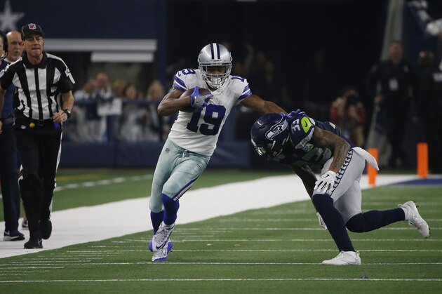 Dallas Cowboys wide receiver Amari Cooper (19) works against the Seattle Seahawks during the first half of the NFC wild-card NFL football game in Arlington, Texas, Saturday, Jan. 5, 2019. (AP Photo/Ron Jenkins)