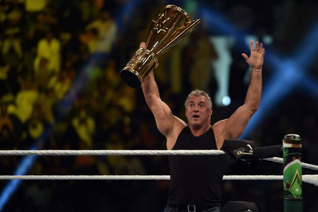 Shane McMahon, SmackDown commissioner and minority owner of WWE, raises the WWE World Cup trophy following the match as part of as part of the World Wrestling Entertainment (WWE) Crown Jewel pay-per-view at the King Saud University Stadium in Riyadh on November 2, 2018. (Photo by Fayez Nureldine / AFP)        (Photo credit should read FAYEZ NURELDINE/AFP/Getty Images)