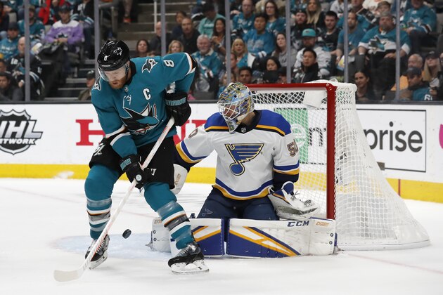 St. Louis Blues goaltender Jordan Binnington (50) makes a save against San Jose Sharks' Joe Pavelski (8) in the first period in Game 5 of the NHL hockey Stanley Cup Western Conference finals in San Jose, Calif., on Sunday, May 19, 2019. (AP Photo/Josie Lepe)