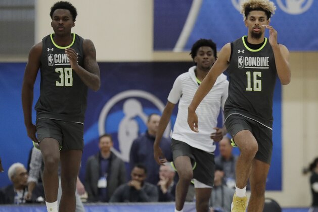 Kris Wilkes, left, and Brian Bowen participate in the second day of the NBA draft basketball combine in Chicago, Friday, May 17, 2019. (AP Photo/Nam Y. Huh)