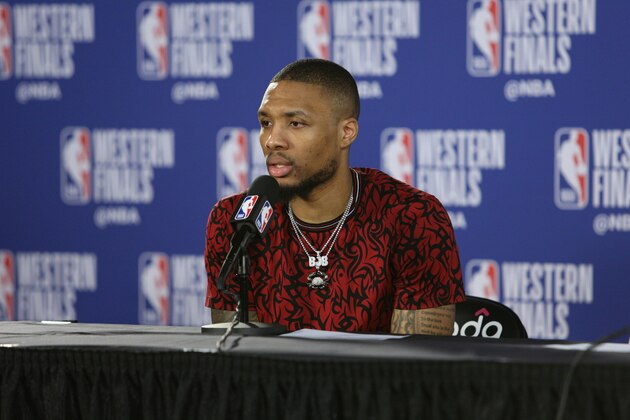 PORTLAND, OR - MAY 20:  Damian Lillard #0 of the Portland Trail Blazers speaks with the media after Golden State Warriors win Game Four of the Western Conference Finals against the Portland Trail Blazers on May 20, 2019 at the Moda Center in Portland, Oregon. NOTE TO USER: User expressly acknowledges and agrees that, by downloading and/or using this photograph, user is consenting to the terms and conditions of the Getty Images License Agreement. Mandatory Copyright Notice: Copyright 2019 NBAE (Photo by Sam Forencich/NBAE via Getty Images)