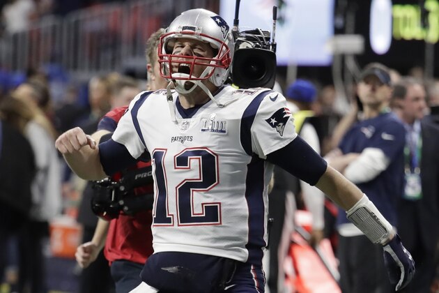 New England Patriots' Tom Brady (12) screams as he enters the stadium before the NFL Super Bowl 53 football game between the Los Angeles Rams and the New England Patriots Sunday, Feb. 3, 2019, in Atlanta. (AP Photo/Lynne Sladky)