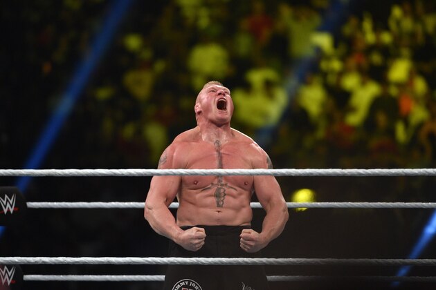 Brock Lesnar celebrates after winning the WWE Universal Championship match as part of as part of the World Wrestling Entertainment (WWE) Crown Jewel pay-per-view at the King Saud University Stadium in Riyadh on November 2, 2018. (Photo by Fayez Nureldine / AFP)        (Photo credit should read FAYEZ NURELDINE/AFP/Getty Images)