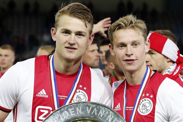 (L-R) Matthijs de Ligt of Ajax, Frenkie de Jong of Ajax during the Dutch Eredivisie match between De Graafschap Doetinchem and Ajax Amsterdam at De Vijverberg stadium on May 15, 2019 in Doetinchem, The Netherlands(Photo by VI Images via Getty Images)